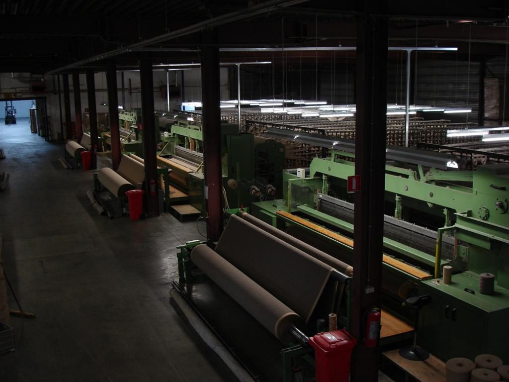 Single rapier flatweave carpet weaving machine